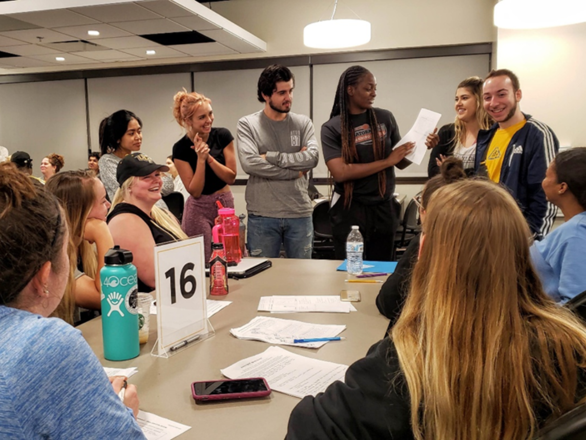 Students present to their peers at the UCF Center for Entrepreneurial Leadership at UCF