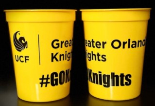 Yellow cup with the UCF pegaus tab logo and the words Greater Orlando Knights and #GoKnights